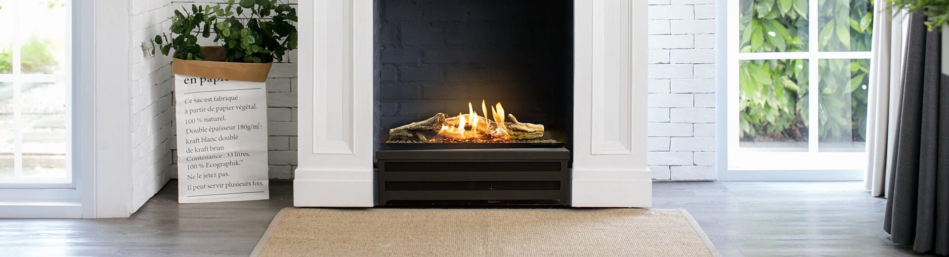 Planika Basket Fire Logs automatische bio-ethanol vuurkorf met keramische houtstammen