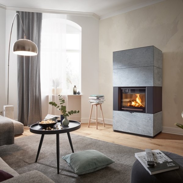 RIKA Ambia design houtkachel in sfeervol interieur